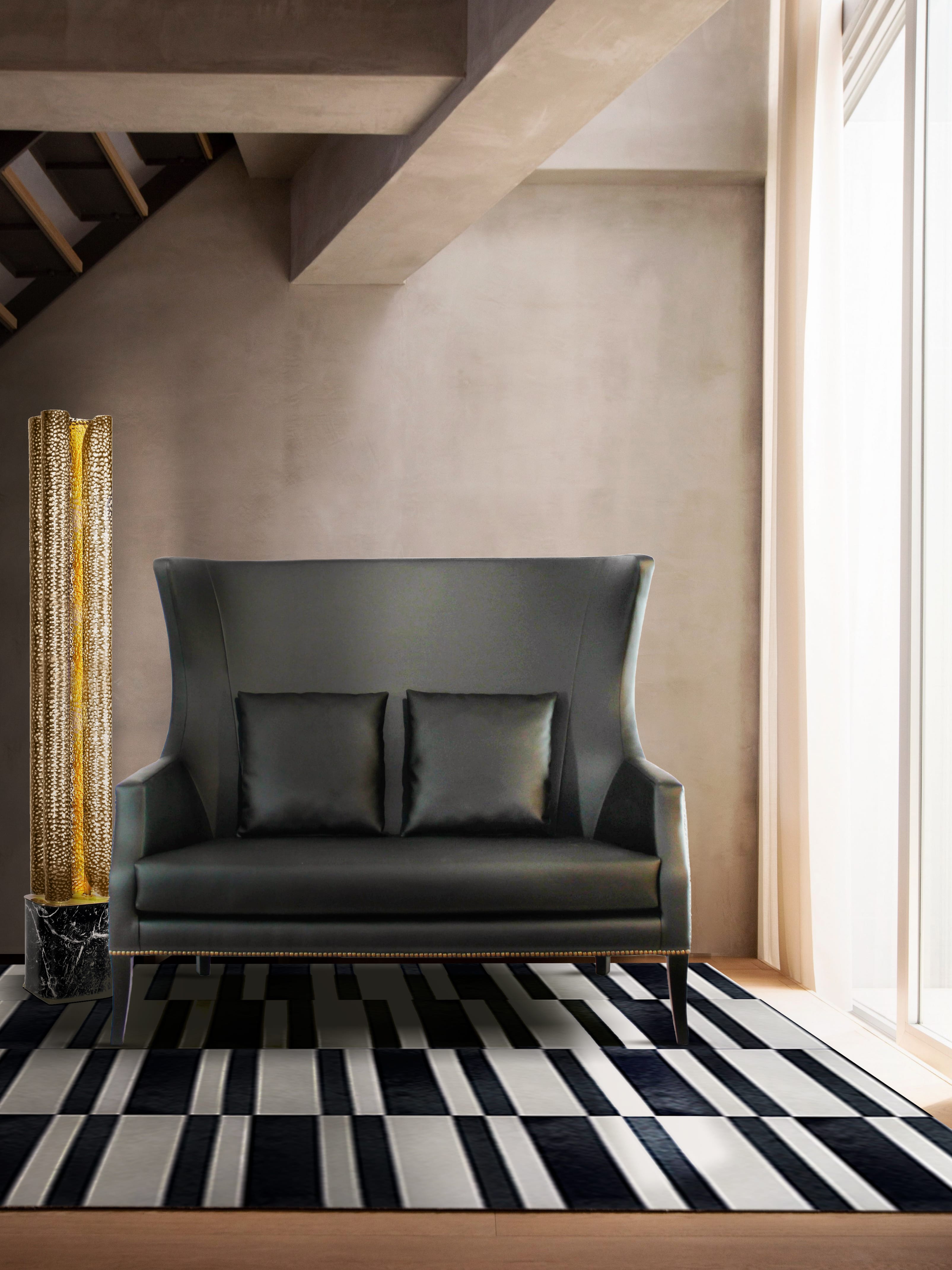 Dark Tones Living Room with Black Leather Sofa and Geometric Rug - Home'Society